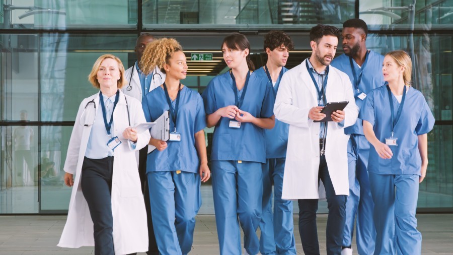 medical team walking through lobby of modern hospi 2025 08 27 11 00 02 utc